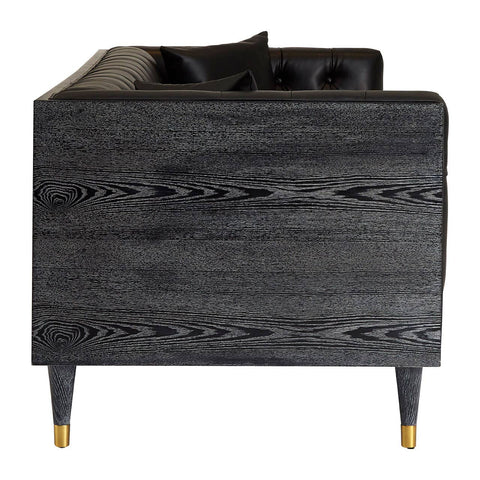 Black faux leather sofa with a sleek design, featuring a low back and rounded edges. The sofa has a smooth texture and is supported by tapered wooden legs. The overall aesthetic is modern and minimalist, suitable for contemporary home decor