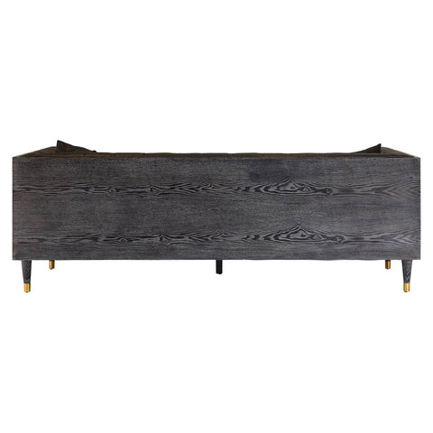 Three-seat sofa upholstered in black faux leather, featuring a sleek and modern design with clean lines. The sofa has a low backrest and is supported by four tapered wooden legs. The overall look is minimalist and stylish, suitable for contemporary living spaces
