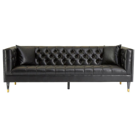 A three-seat sofa upholstered in black faux leather, featuring a tufted backrest and sleek, gold-colored legs. The design includes armrests with a modern, angular shape, creating a stylish and contemporary look suitable for various living spaces