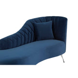 Dark blue velvet chaise longue with a curved backrest and a plush cushion, featuring vertical tufting on one side and sleek metal legs