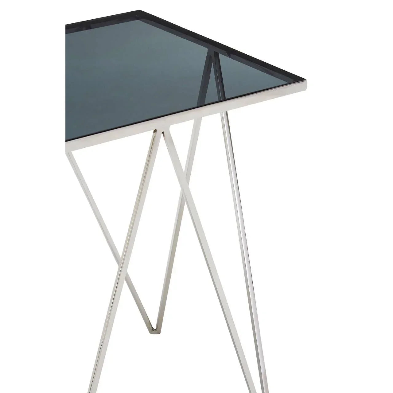 Modern glass side table with chrome metal legs and geometric base close-up