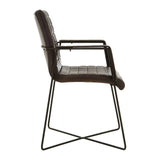 Brown leather dining chair with metal frame shown in side profile