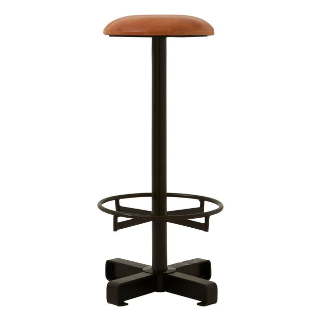 Buffalo light brown leather bar stool featuring a round seat, a sturdy metal base with a footrest, and a cross-shaped support structure