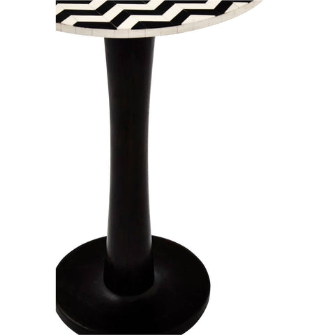 Round acacia wood pedestal side table featuring a mosaic design on the top surface, supported by a sleek black pedestal base. The table has a smooth, circular top with a decorative pattern and a sturdy, minimalist stand