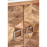 Close-up view of a cabinet featuring a geometric design made from mango wood, showcasing a rich wood grain pattern. The cabinet has two doors with sleek square metal handles, highlighting a modern aesthetic. The top surface appears to be made of marble, adding an elegant touch to the overall design