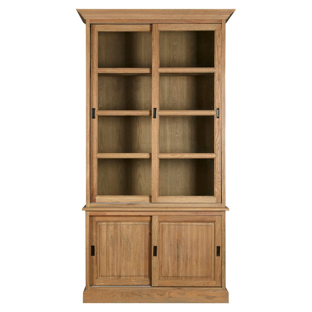 Tall cabinet made of oak wood with a washed grey finish, featuring two glass-paneled doors at the top with four shelves inside, and two solid doors at the bottom with a textured wood appearance. The cabinet has a classic design with a crown molding top and a sturdy base