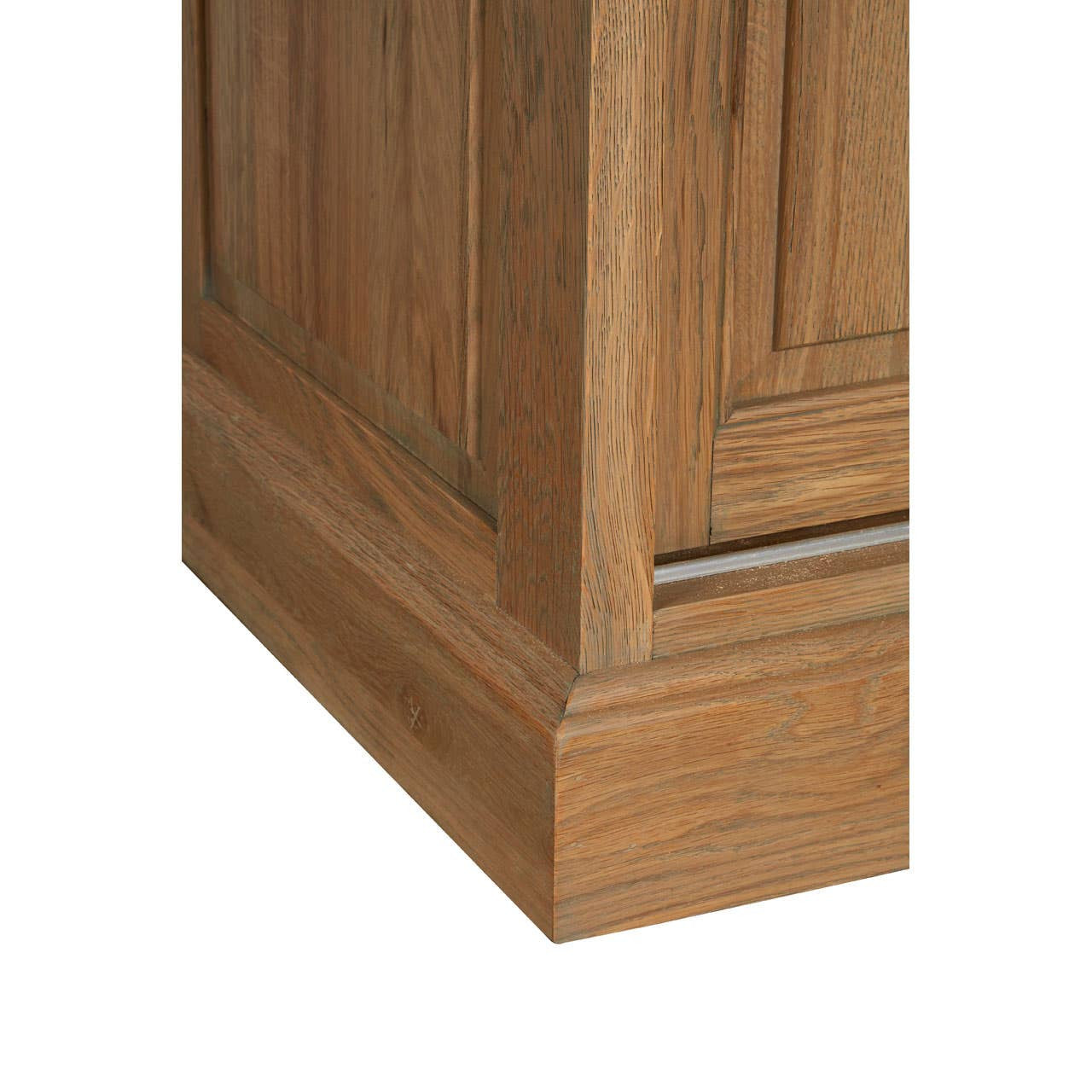 Close-up view of the base of the Lyon Oak Wood Tall Cabinet, showcasing the washed grey finish and detailed wood grain texture. The cabinet features a sturdy, rectangular design with clean lines and a subtle paneling effect on the sides