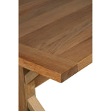 Closeup of solid oak dining table corner showing natural wood grain finish