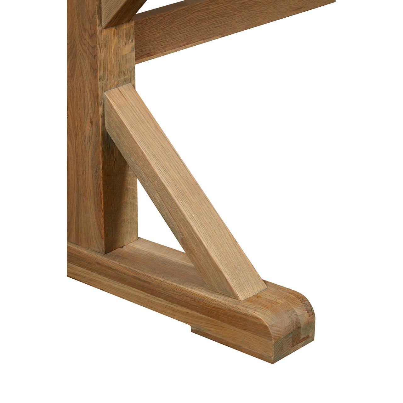 Oak dining table trestle leg with angled support and natural wood grain finish