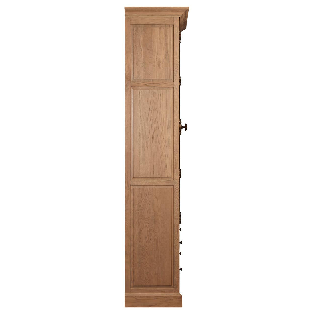 Tall cabinet made of oak wood with a washed grey finish, featuring a sleek design and multiple storage compartments. The cabinet has a smooth surface and a minimalist aesthetic, suitable for various home decor styles