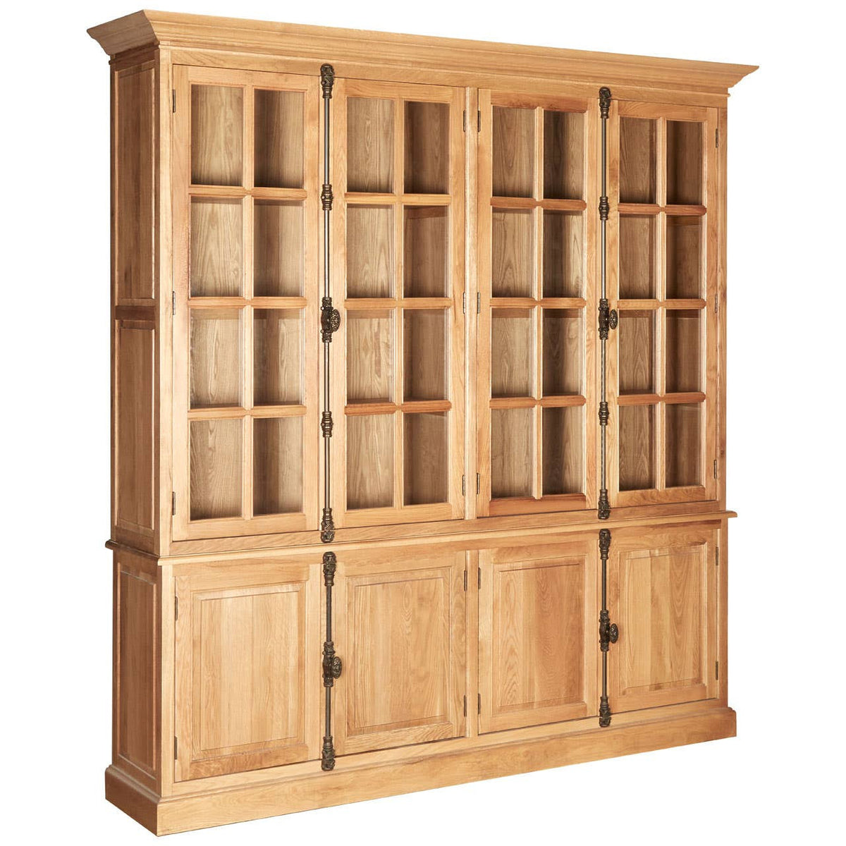 Large cabinet made of natural oak wood featuring a classic design with multiple glass-paneled doors on the top half and solid wood doors on the bottom half. The cabinet has a light wood finish, showcasing the grain of the oak, and is adorned with decorative hardware