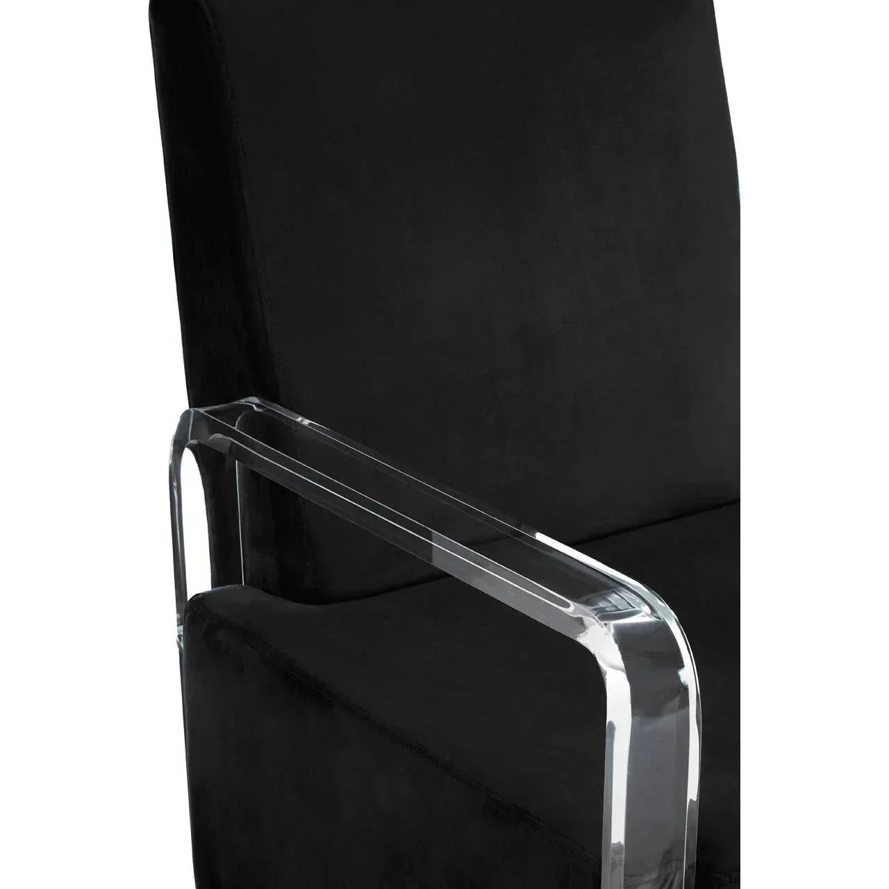 Black velvet accent chair with clear acrylic armrest, side angle view