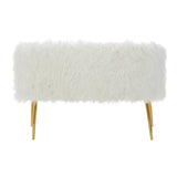 Soft white fur-effect upholstery covers a two-seater sofa, supported by sleek gold legs, creating a modern and luxurious look. The sofa features a minimalist design with a rectangular shape and rounded edges