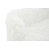 Soft white fur-effect upholstery covers the armrest of a two-seater sofa, showcasing a plush texture. The sofa features sleek gold legs that add a touch of elegance to the design