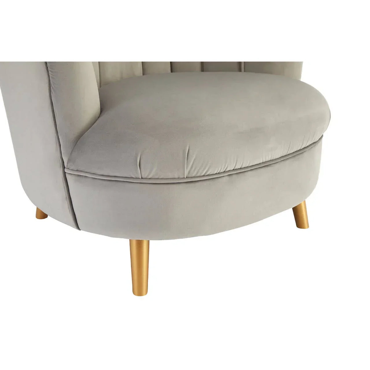 Light grey velvet accent chair with gold legs, close-up of seat and lower frame
