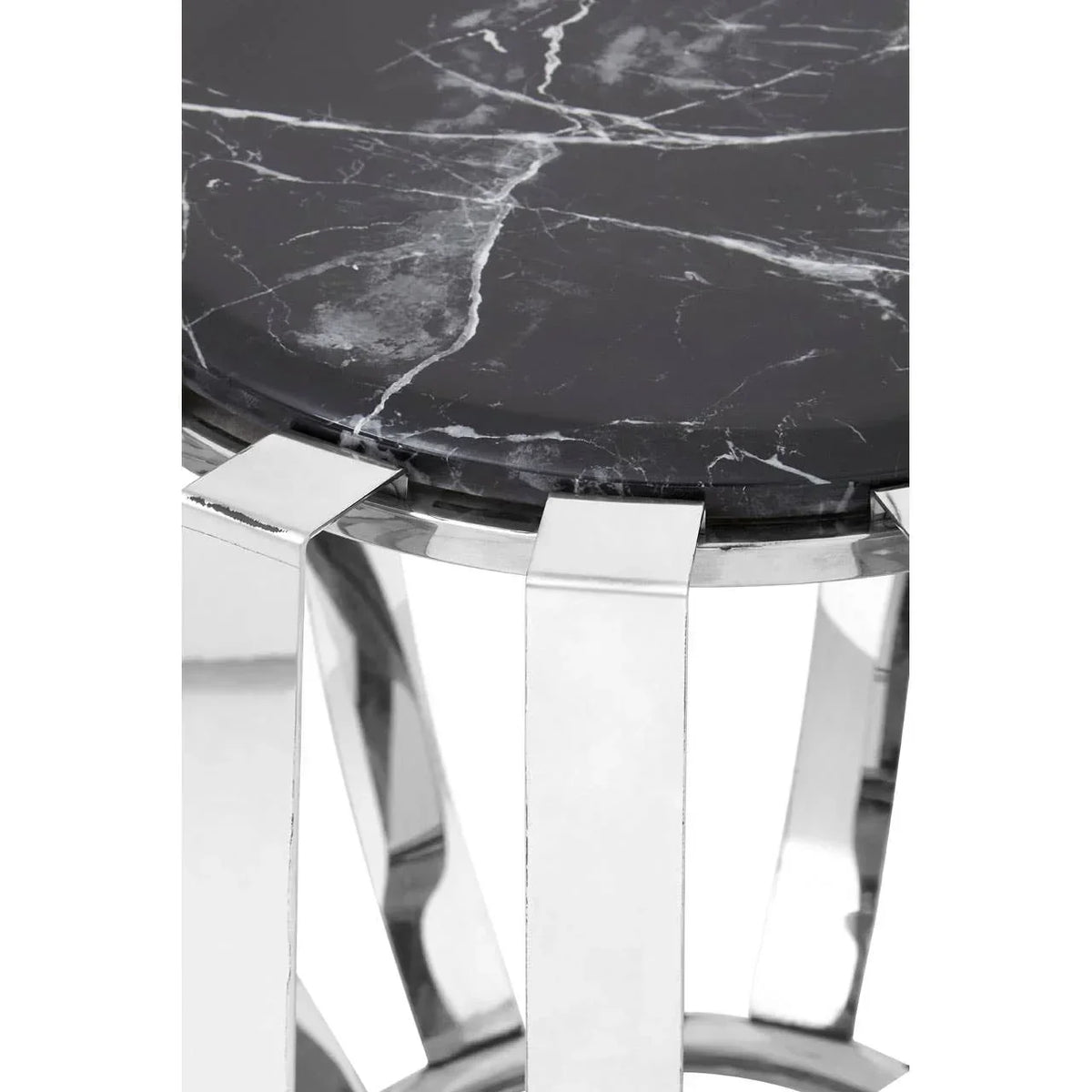 Black marble side table with chrome metal legs, close-up of top and frame details