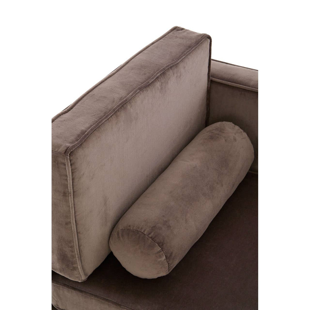 Grey velvet chaise longue featuring a plush backrest and a cylindrical bolster pillow, showcasing a soft texture and elegant design. The left-hand side is highlighted, emphasizing its modern style and comfortable seating