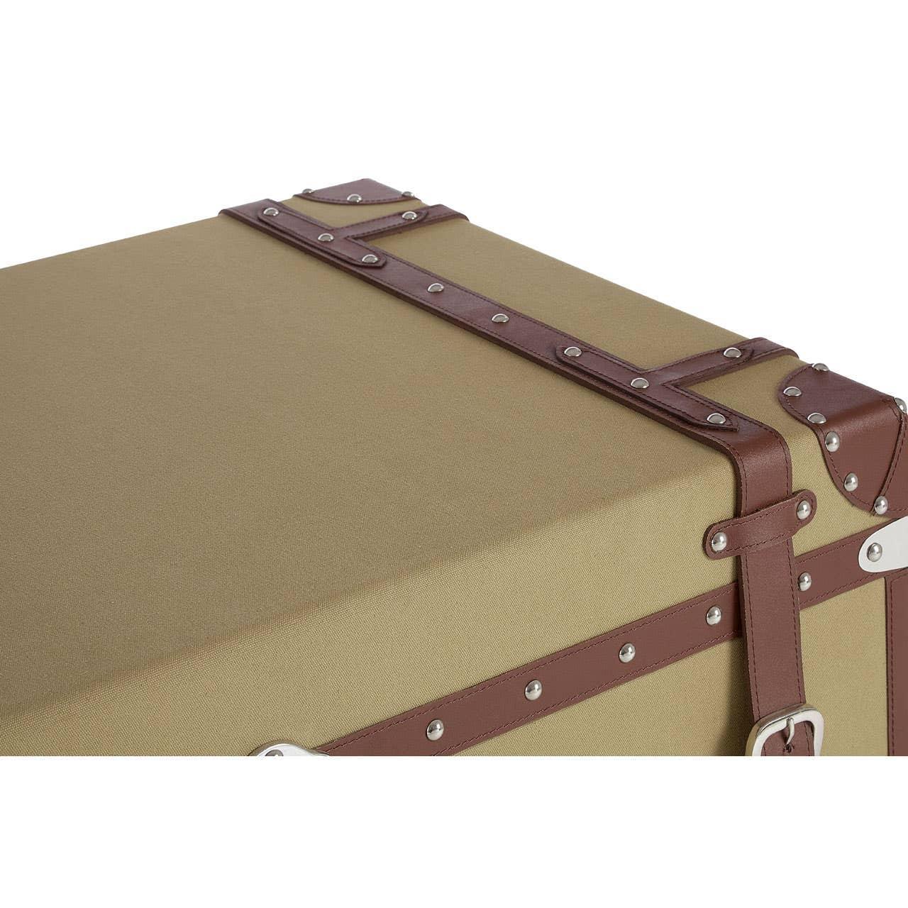 Tan storage trunk with brown faux leather straps and silver rivet detailing, angled view