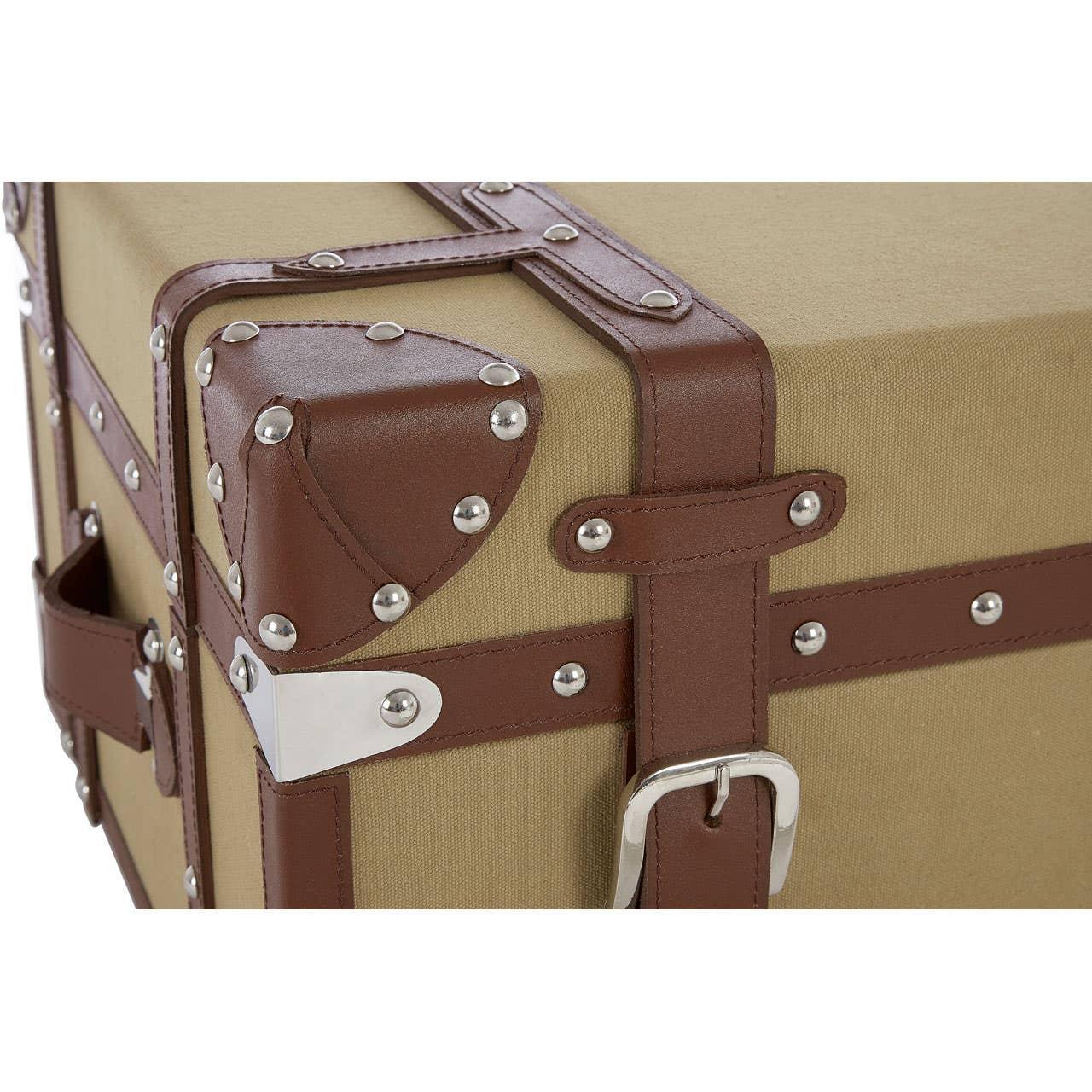 Canvas storage trunk with brown leather trim, corner studs, and silver hardware detail