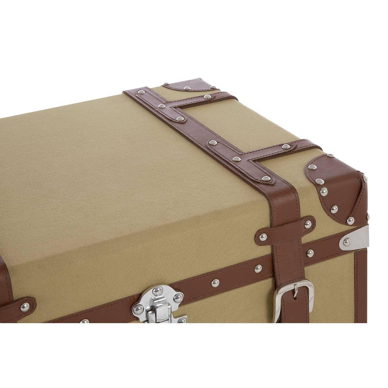 Beige storage trunk with brown faux leather straps and silver rivet accents