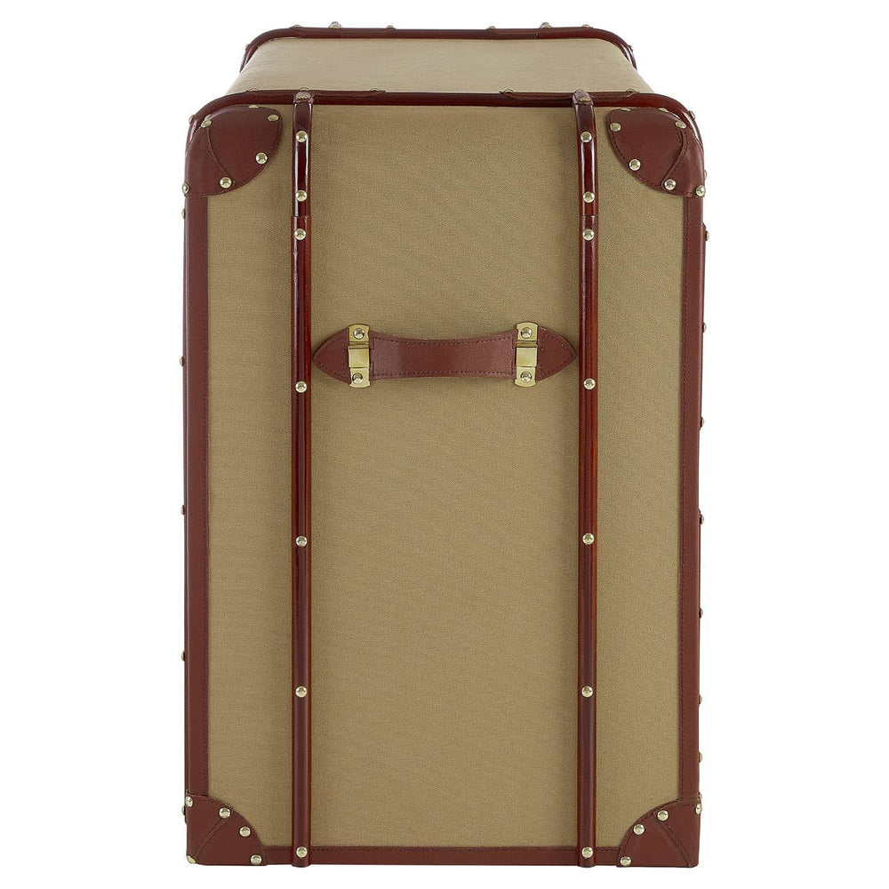 Columbus Trunk Style Chest featuring a beige exterior with brown leather accents, two drawers with brass handles, and decorative corner protectors, designed to resemble a vintage trunk