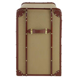 Columbus Trunk Style Chest featuring a beige exterior with brown leather accents, two drawers with brass handles, and decorative corner protectors, designed to resemble a vintage trunk