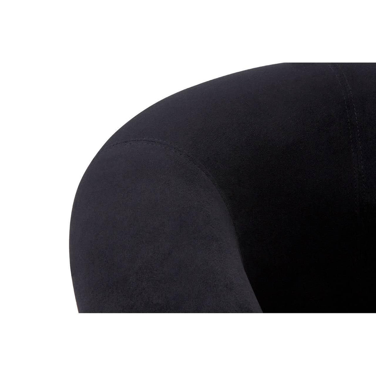 Close-up of black upholstered sofa armrest showing soft fabric texture and stitching detail