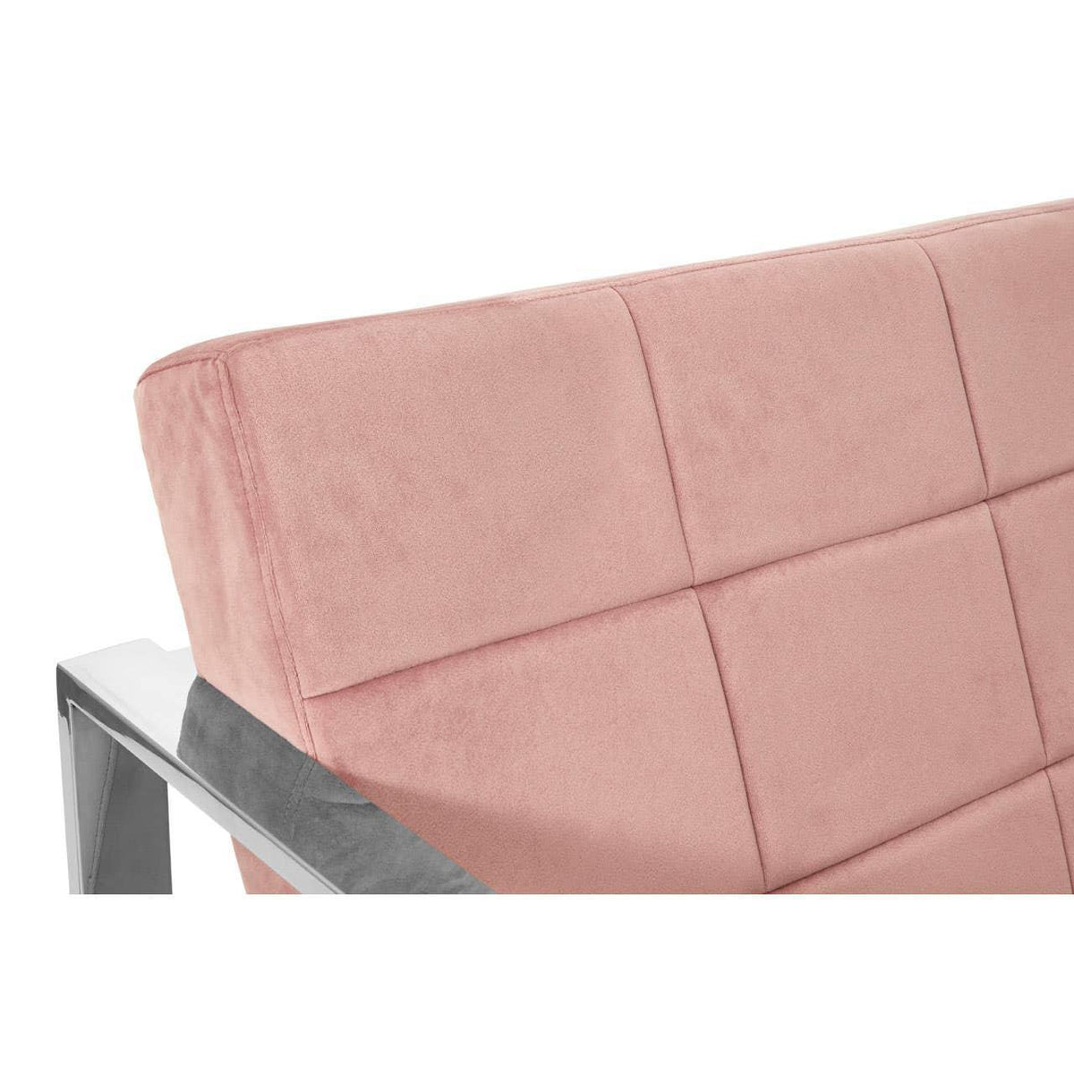 Blush pink fabric sofa backrest with grid stitching and chrome frame detail