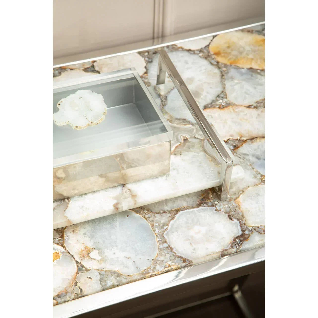 Rectangular console table with agate stone top and chrome frame, close view of surface