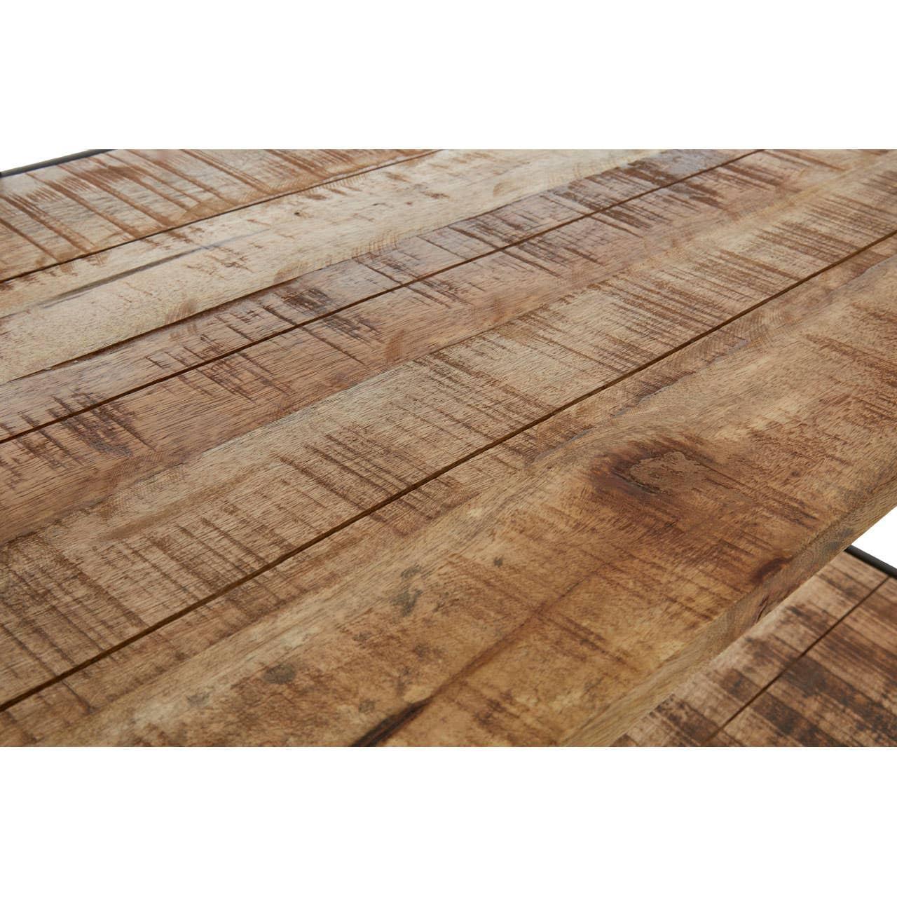 Closeup of rustic wooden dining table surface with natural grain and plank detailing