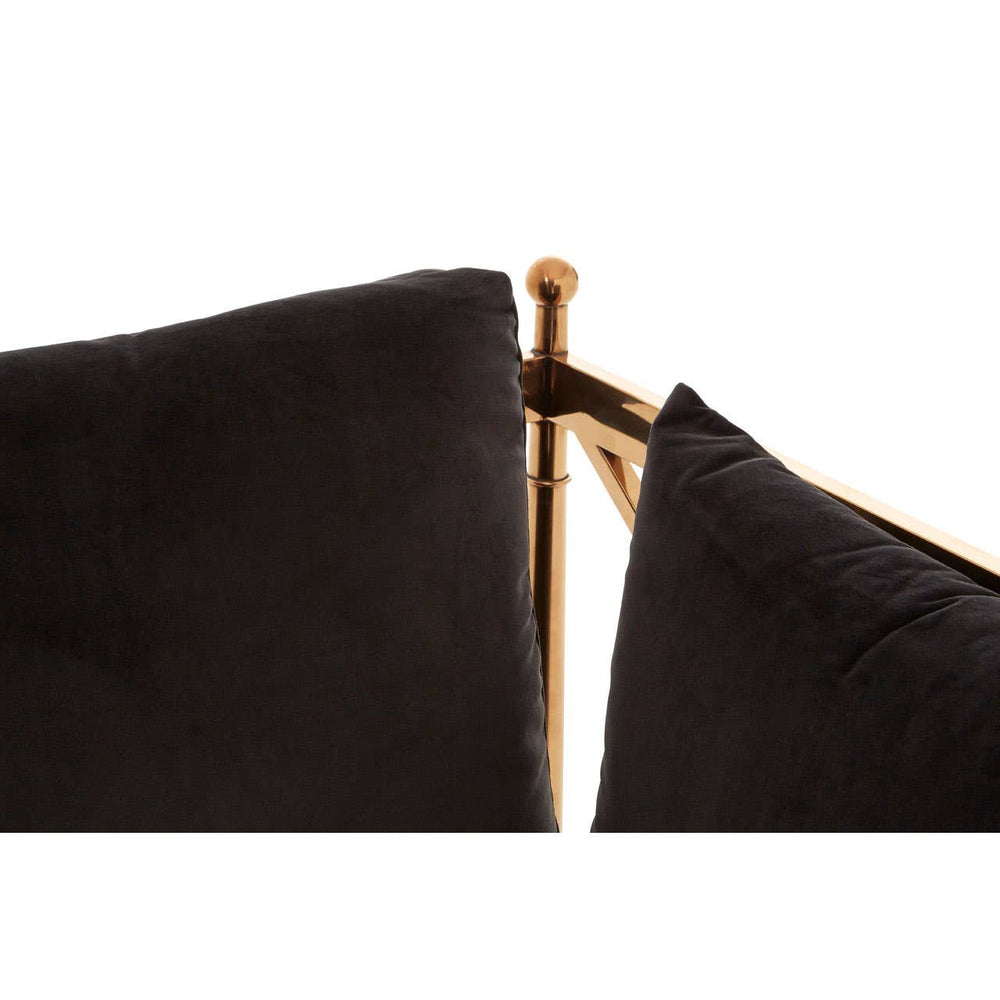 Black velvet upholstery with a sleek rose gold frame, showcasing the corner detail of a three-seater sofa. The fabric appears soft and luxurious, while the metallic accents add a modern touch