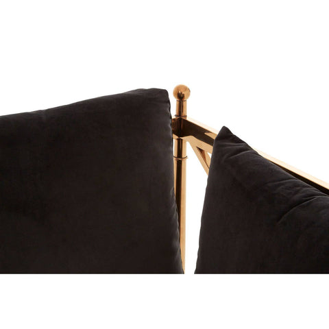 Black velvet upholstery with a sleek rose gold frame, showcasing the corner detail of a three-seater sofa. The fabric appears soft and luxurious, while the metallic accents add a modern touch