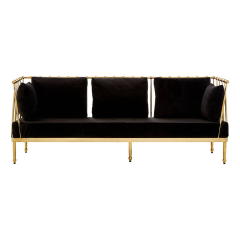 Three-seater sofa featuring a sleek black velvet upholstery with plush cushions, supported by a stylish gold finish frame and legs, showcasing a modern and elegant design