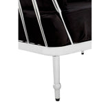 Black velvet upholstery with a sleek silver frame, showcasing a modern design. The sofa features a low back and clean lines, supported by slender legs. The overall aesthetic is elegant and contemporary, suitable for various interior styles