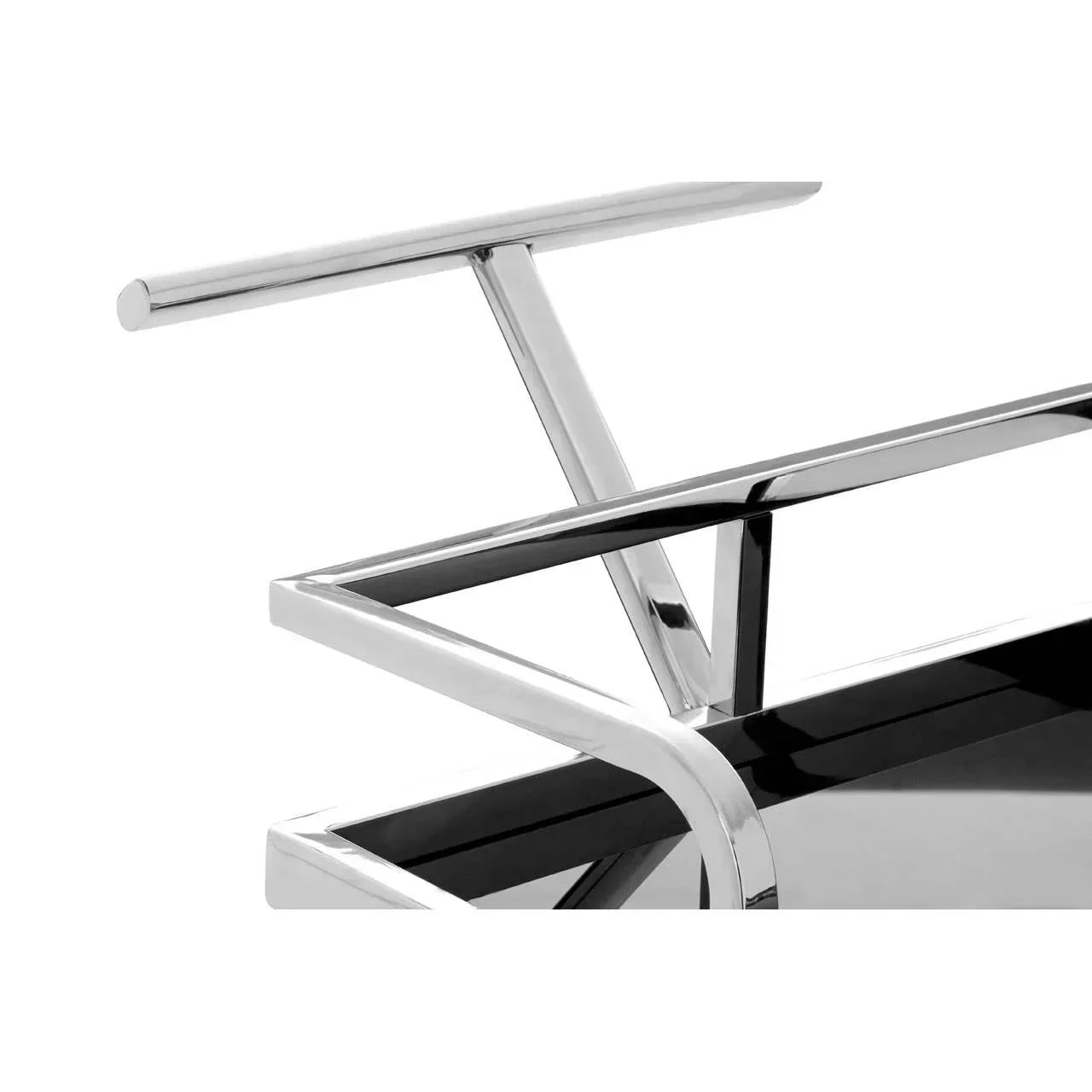 Polished chrome coffee table frame with sleek handle and black glass top, close-up view
