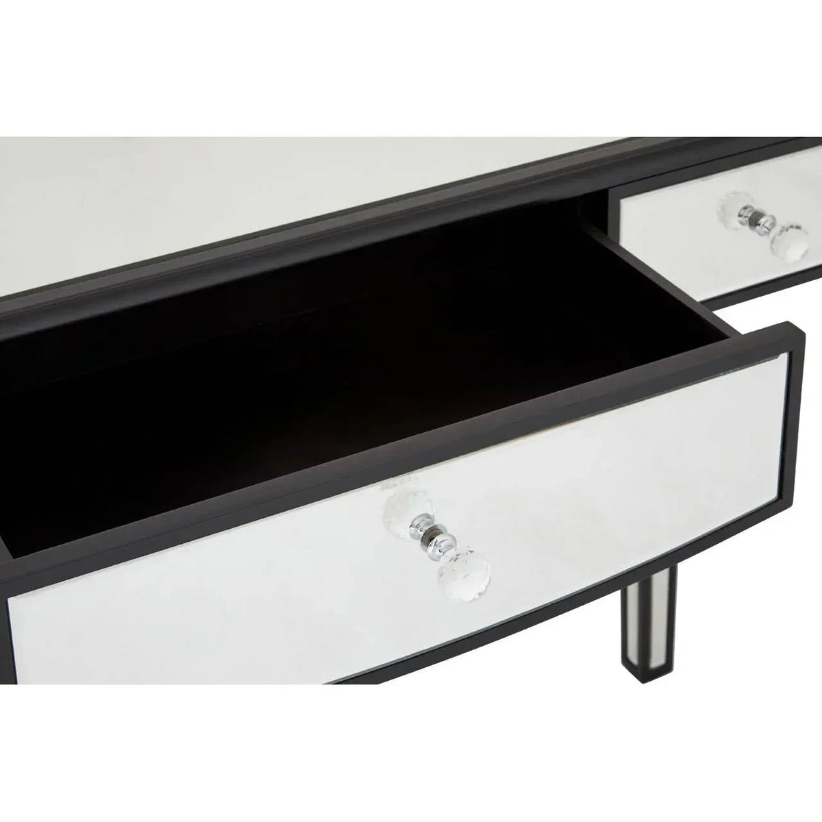 Mirrored dressing table drawer with crystal handle and black trim open for storage view