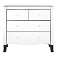 White chest of four drawers featuring a sleek design with a smooth surface, two smaller top drawers and two larger bottom drawers, all equipped with round silver handles. The chest is complemented by a mirror frame, and it stands on short, tapered black legs