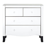White chest of four drawers featuring a sleek design with a smooth surface, two smaller top drawers and two larger bottom drawers, all equipped with round silver handles. The chest is complemented by a mirror frame, and it stands on short, tapered black legs