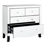 A white chest of four drawers featuring a sleek design with a mirror frame, showcasing three smaller top drawers and one larger bottom drawer partially open, revealing the interior. The chest is supported by short, curved legs