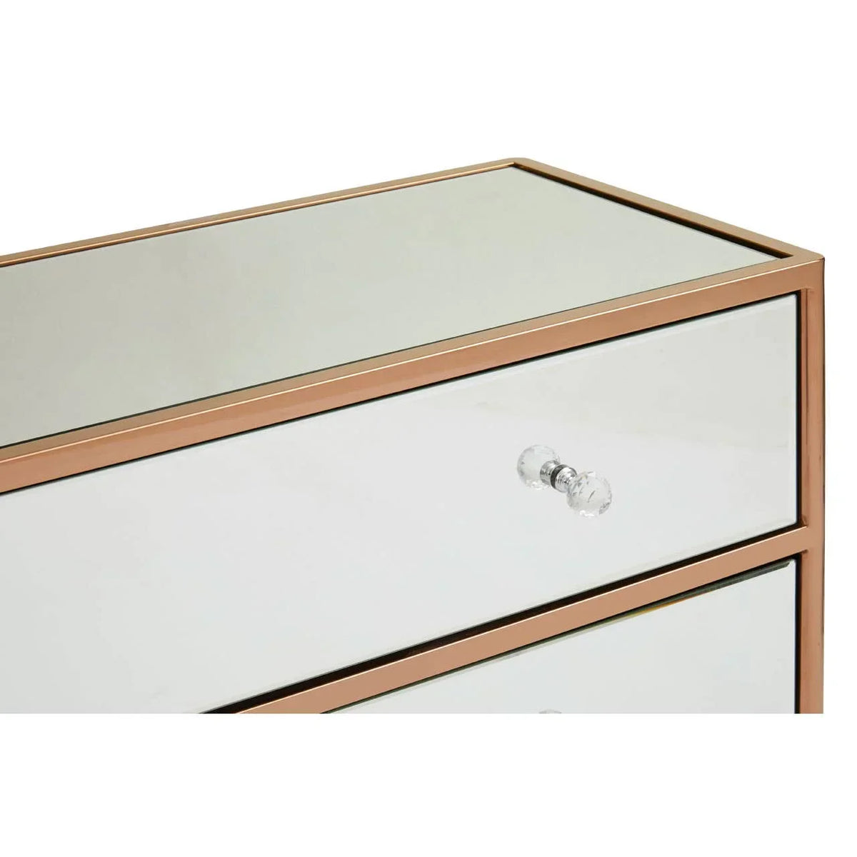 Mirrored bedside table with rose gold frame and glass drawer knob, angled close-up view