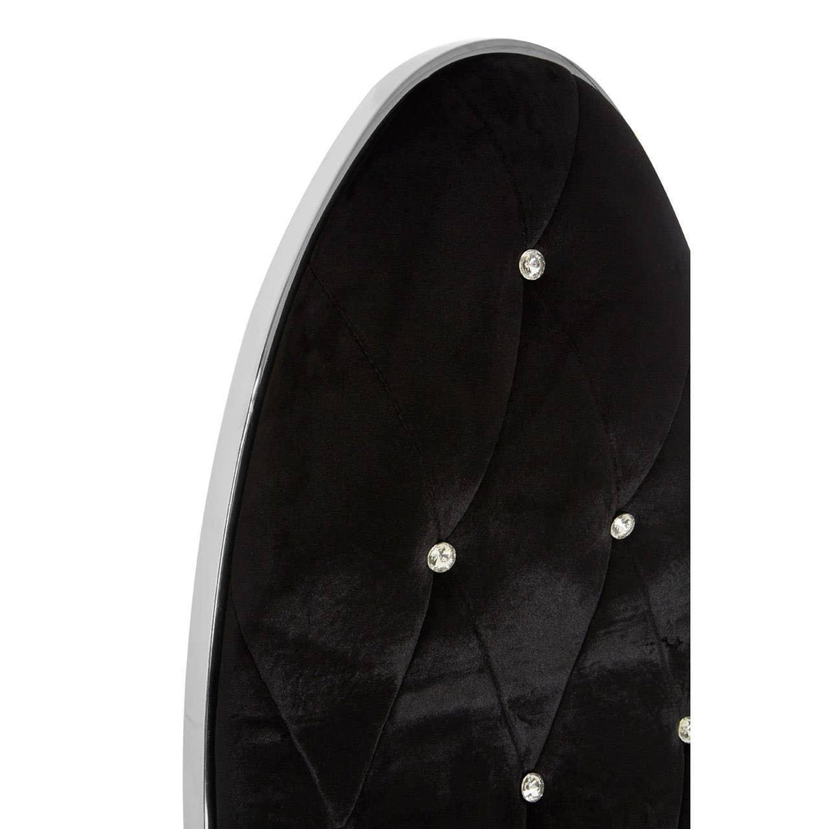 Black velvet headboard with diamond button tufting and chrome trim detail
