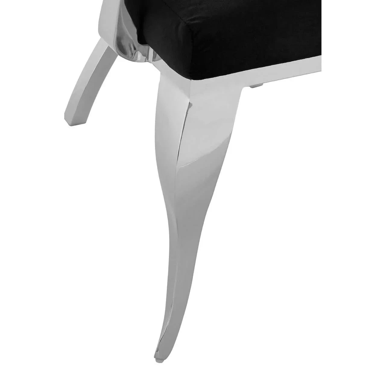 Polished chrome dining bench leg with black upholstered seat corner