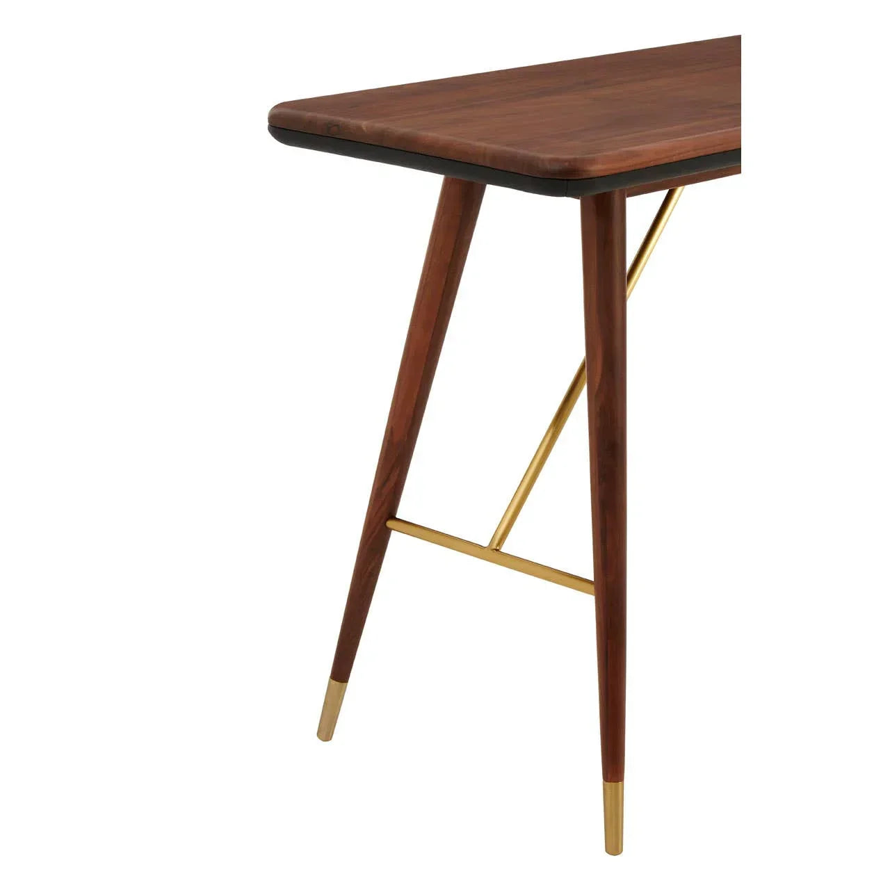 Walnut dining table corner with gold metal accents and angled legs