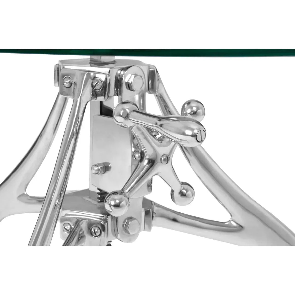 Close-up of chrome metal table base with glass tabletop and industrial-style handle