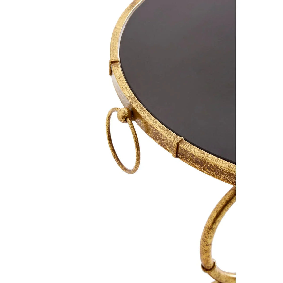 Round side table with black glass top and gold metal frame, close view of ring detail