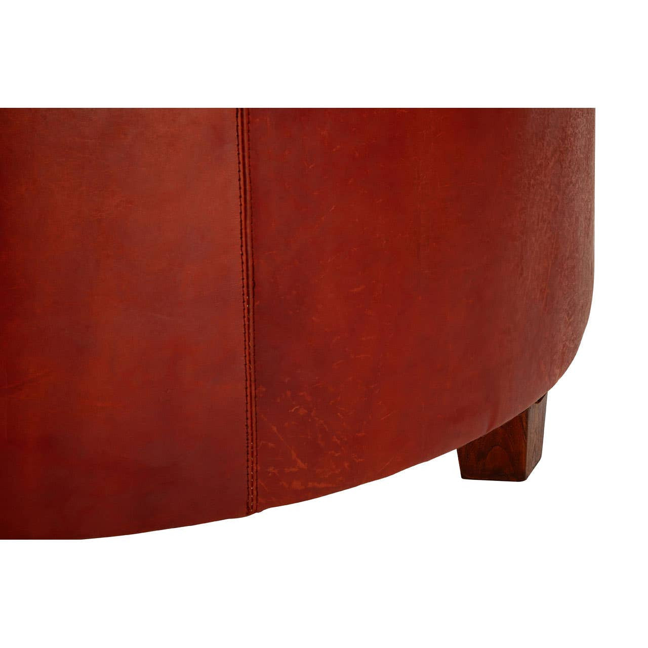 Round large stool featuring button tufting in antique brown leather, with a smooth, rounded top and sturdy wooden legs. The leather has a rich, warm tone and a subtle sheen, highlighting its texture and craftsmanship