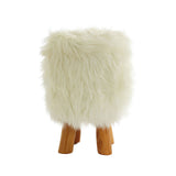 Round footstool covered in soft white faux fur, featuring four wooden legs that provide stability and a warm contrast to the fluffy texture