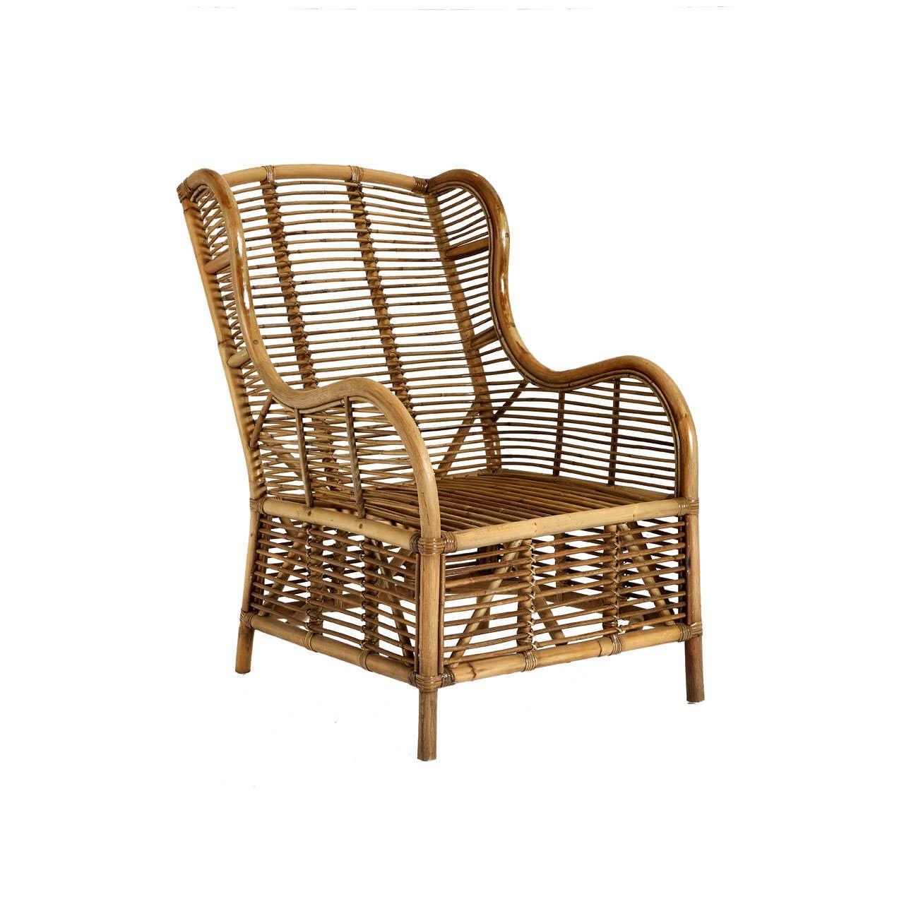 Natural rattan armchair with high curved back and open weave design