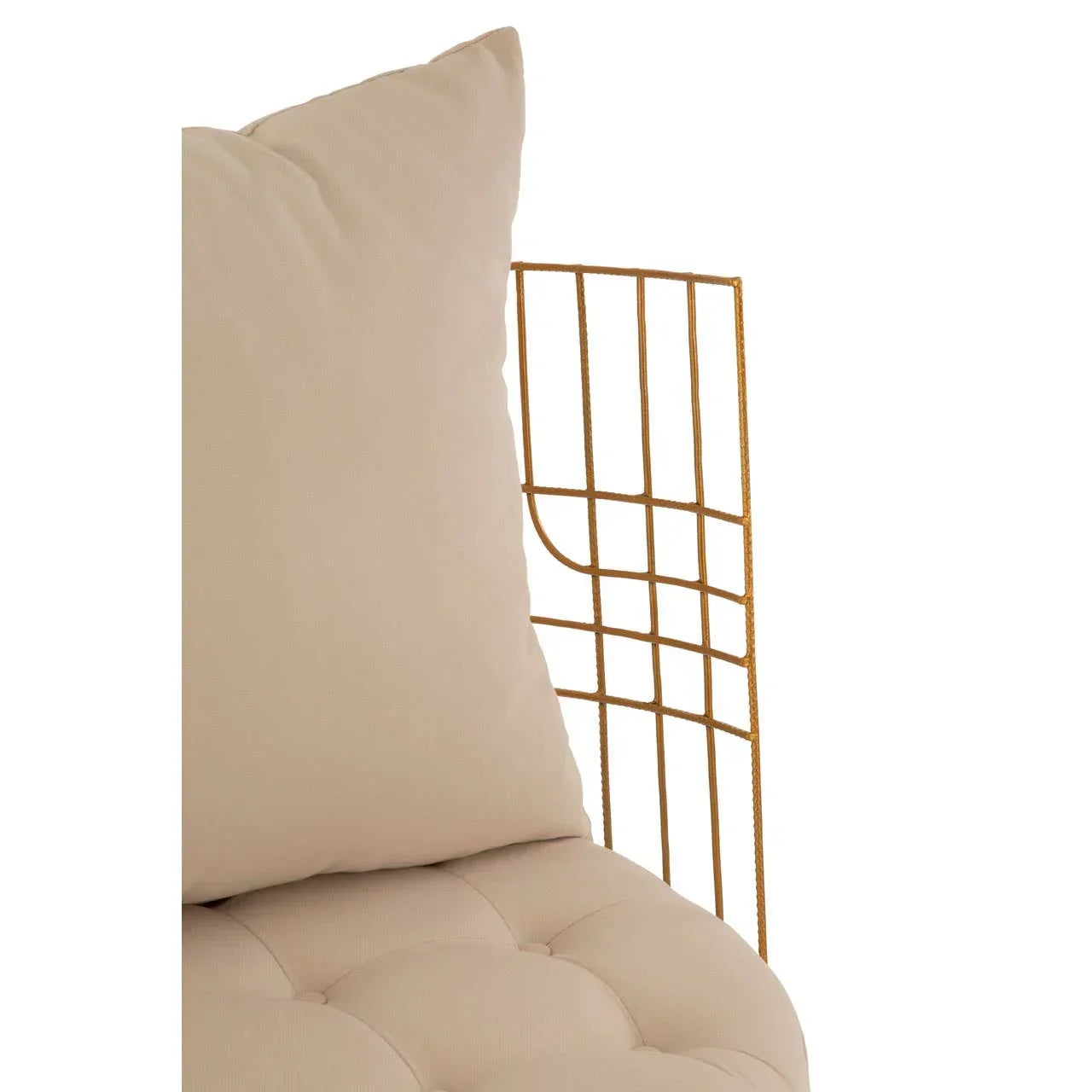 Beige cushion on tufted seat with gold metal frame detail, close-up corner view