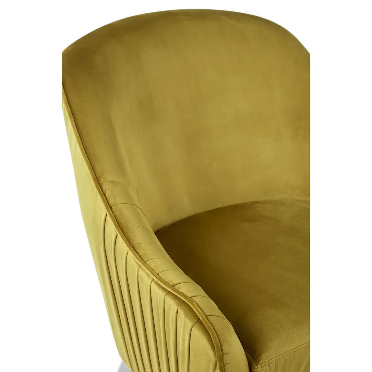 Mustard yellow velvet armchair with pleated backrest, close-up of seat and upholstery detail